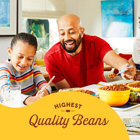 Stovetop heating Bush's Best Onion Baked Beans for quick serve.