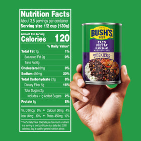 Bush's Best Taco Fiesta Black Beans poured in bowl – convenient plant-powered dinner option.