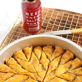 Bees Knees salted honey squeeze bottle convenient for quick drizzle.
