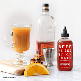 Gluten-free and paleo-friendly labeling on the Bees Knees bottle
