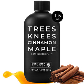 Bushwick Kitchen Trees Knees Cinnamon Maple Syrup bottle enhances pancakes with warm cinnamon.