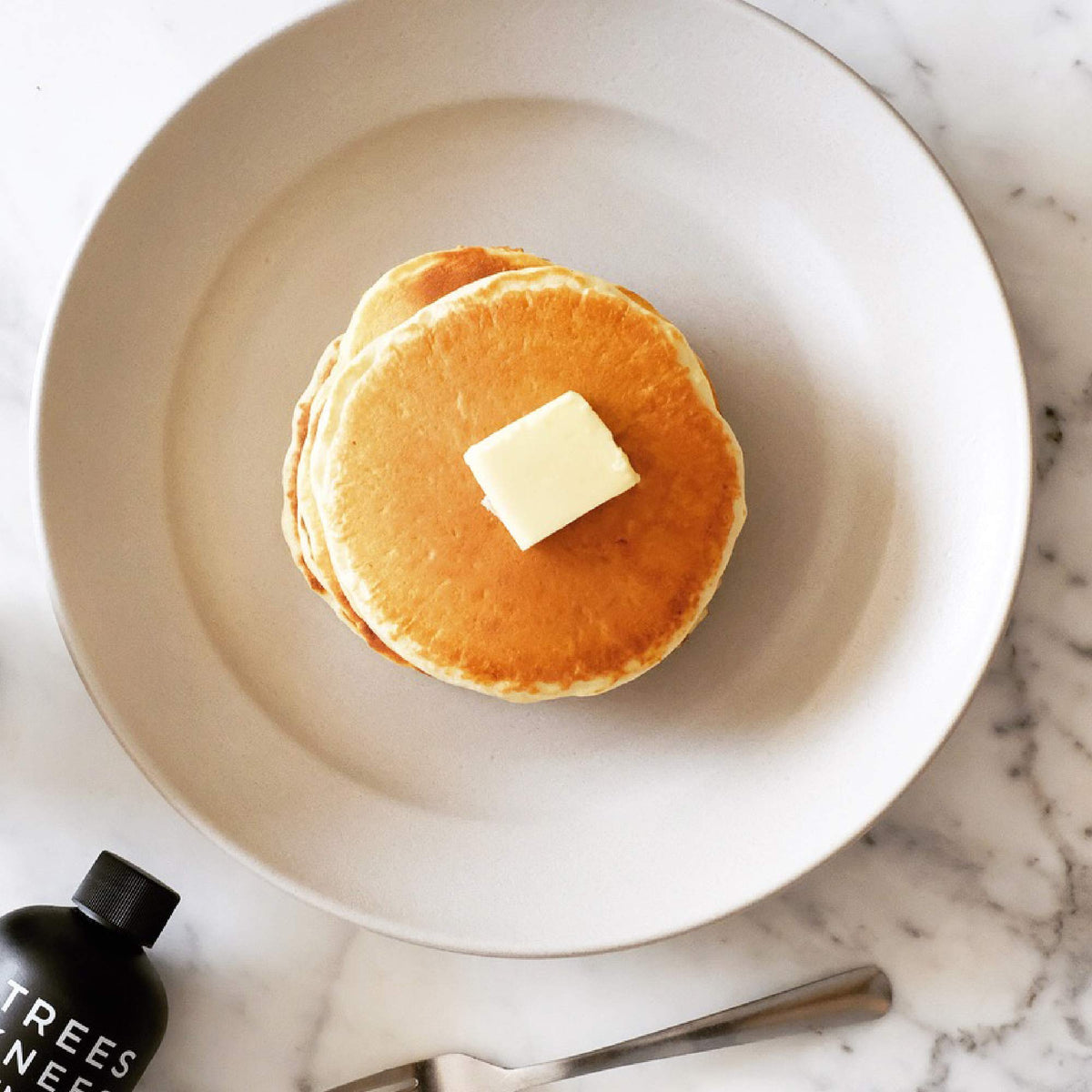 Bushwick Kitchen Trees Knees Cinnamon Maple Syrup boosts coffee with subtle spice.