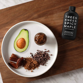 Trees Knees Syrup on fresh berries highlighting sweet heat