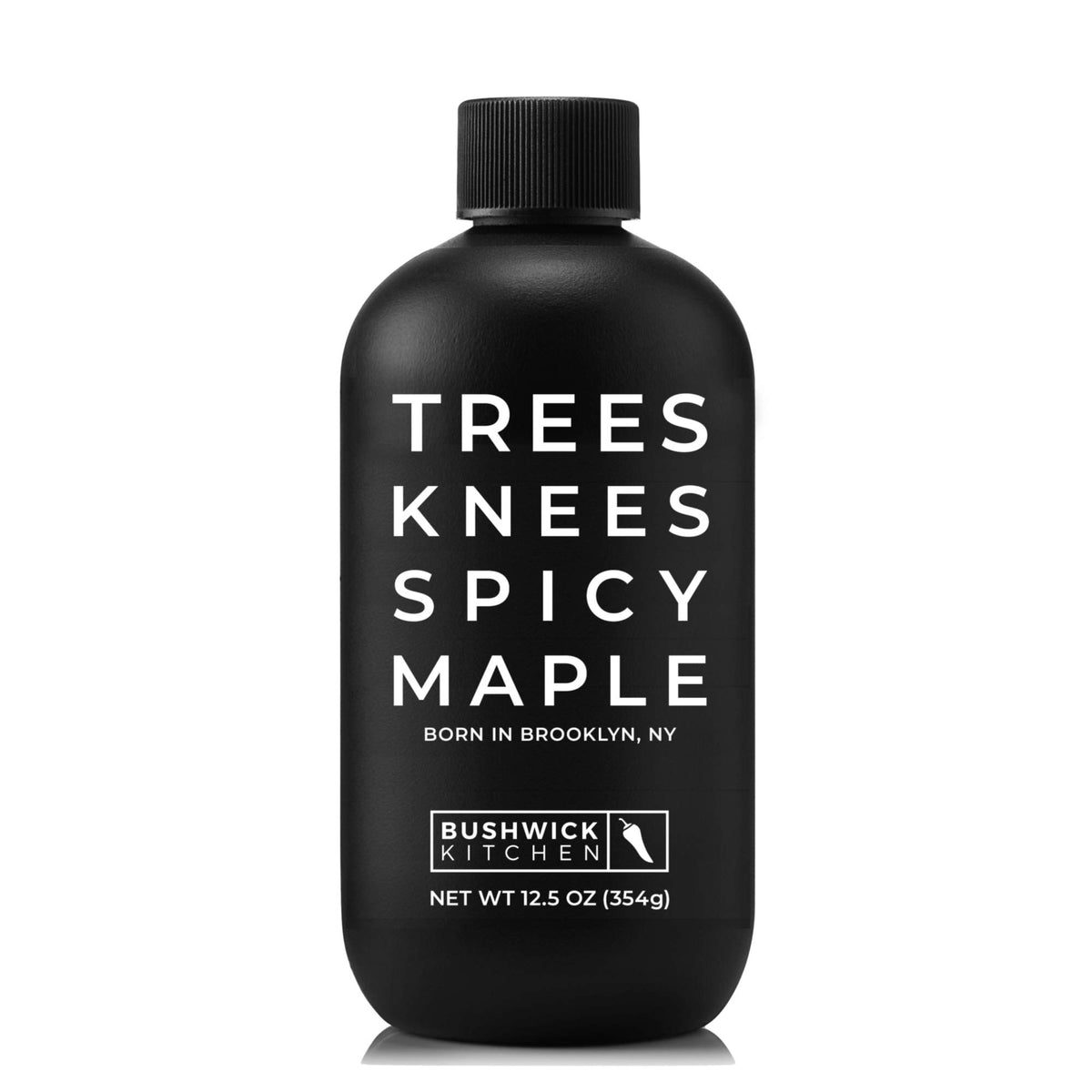 Bushwick Kitchen Trees Knees Spicy Maple Syrup bottle showing rich maple with habanero heat for mornings