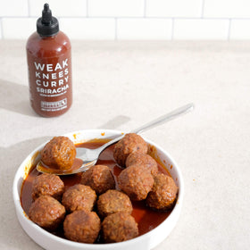 Bushwick Kitchen curry sriracha squeeze bottle ideal for ramen and wings.