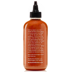 Top view of Bushwick Kitchen Weak Knees bottle with vibrant gochujang-sriracha blend