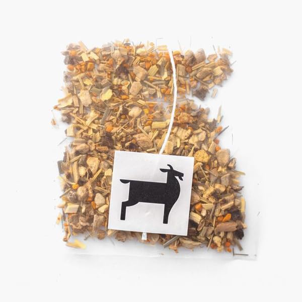 Bushwick Tea cup with steam reveals saffron hues and citrus notes in a caffeine-free blend.