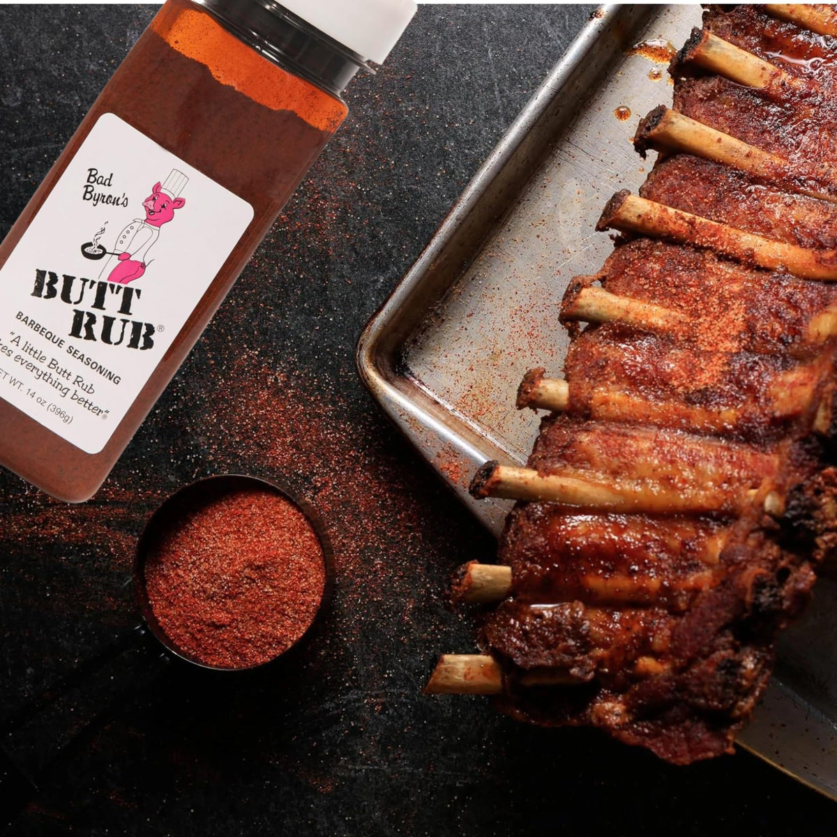Butt Rub on grill with pork ribs suggests championship-grade flavor.