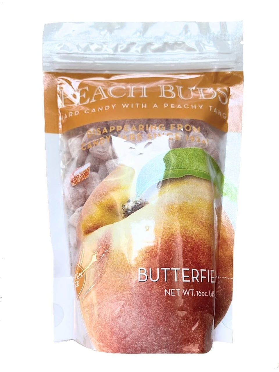 Butterfields Peach Buds jar closeup—glossy peach-coconut gems for nostalgic moments.