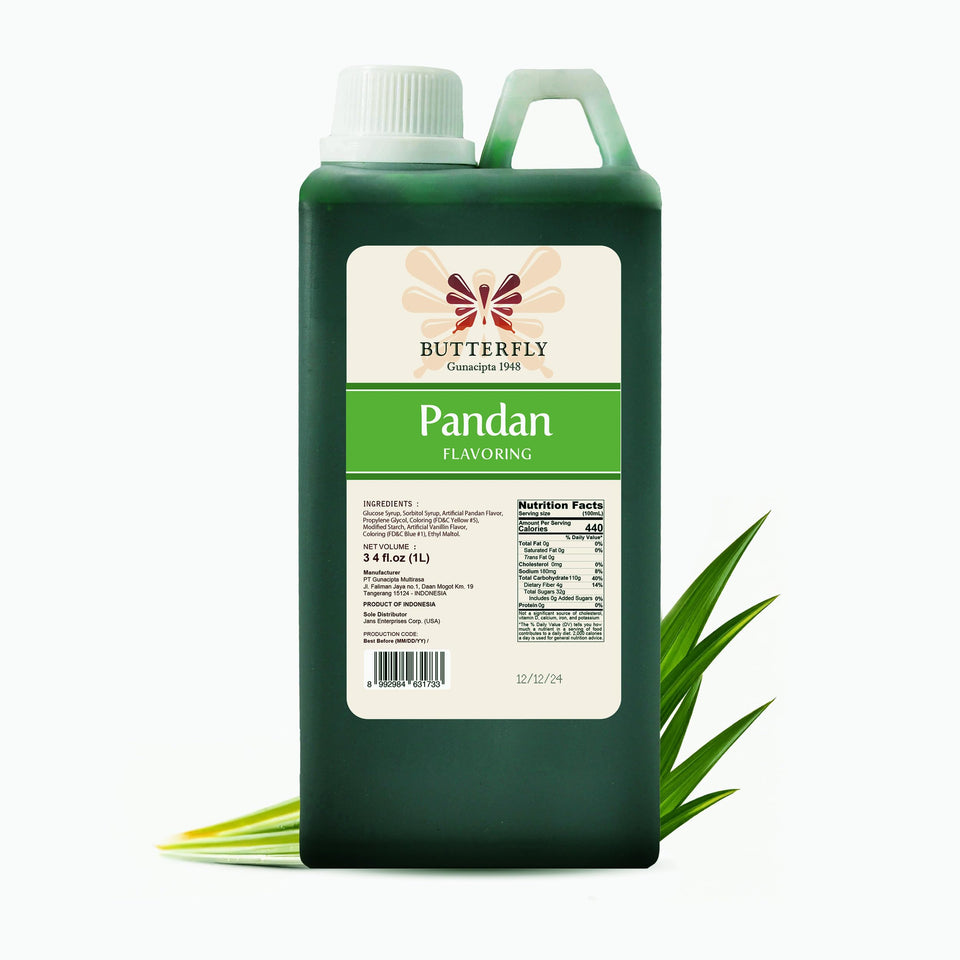 Butterfly Pandan Flavoring Extract bottle pour; intense pandan aroma for baking and beverages.