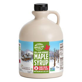 Butternut Mountain Farm Dark Robust syrup bottle pouring over pancakes for rich maple flavor