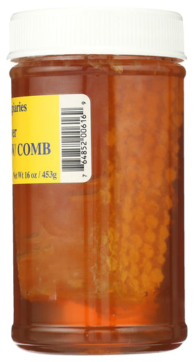 Buzzn Bee honey pour on spoon with wood background for everyday sweetness.