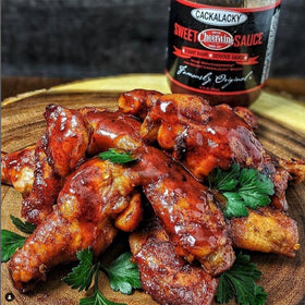 North Carolina made badge beside Cackalacky Cheerwine Sweet BBQ Sauce.