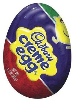 Cadbury Creme Eggs four-piece pack on a festive dessert table.