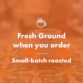 Cafe Grumpy Brooklyn women-owned badge signals independent craft and ethical partners.