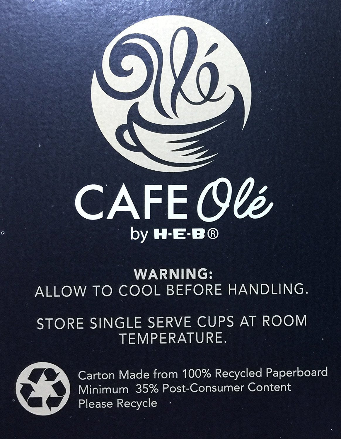 Cafe Olé Snickernut box opened beside a prepared cup signaling ready-to-brew convenience.