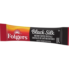 Cafe Bustelo Folgers Black Silk Instant Coffee Crystals dissolving in a mug for an on-the-go brew.