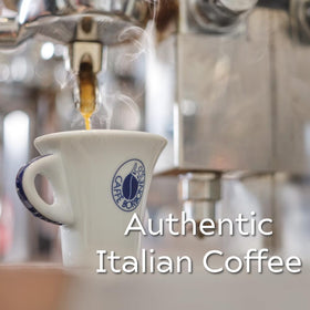 Caffe Borbone Blue Blend ground coffee in grinder, ready for a quick, flavorful brew.