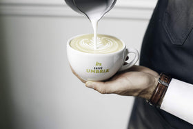 CAFFE UMBRIA Arco Etrusco roast scene, showcasing fresh daily roasting in Seattle