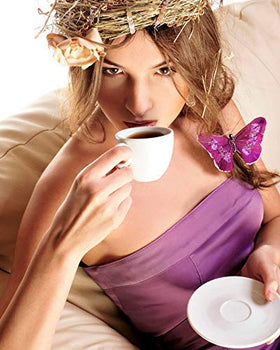 Cake Boss Raspberry Truffle packaging and cup together convey indulgence.