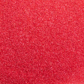 Close-up of Cake Mate red crystals for decorations.