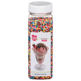 Cake Mate dessert sprinkles with easy pour lid in rainbow color for mess-free decorating