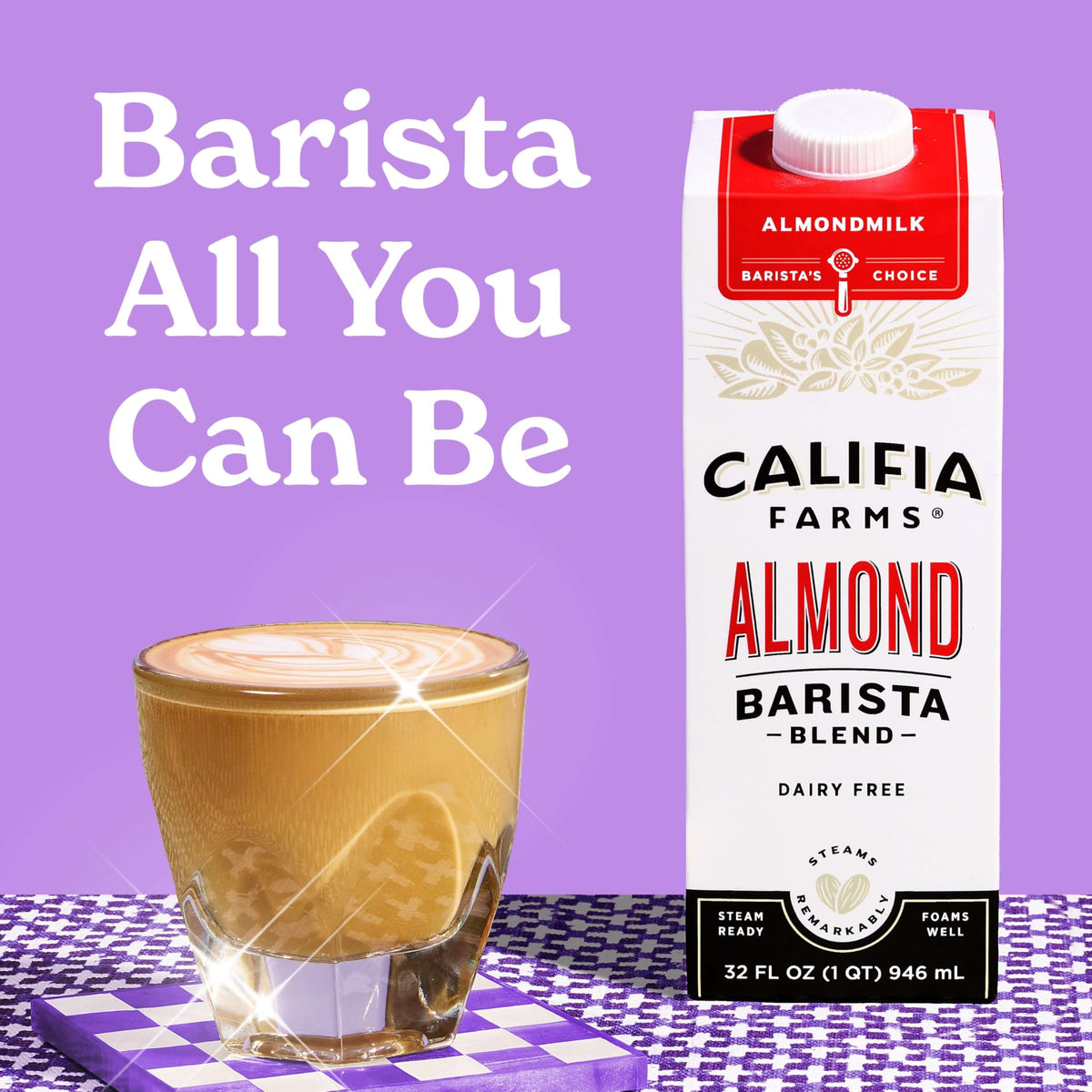 Califia Farms Almond Barista Blend foaming in a pitcher for latte art.