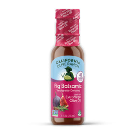 The California Olive Ranch Fig Balsamic Dressing bottle is ideal for salads and fruit pairings.