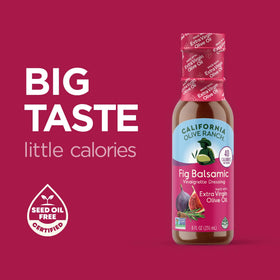 California Olive Ranch Fig Balsamic Dressing is poured over greens.