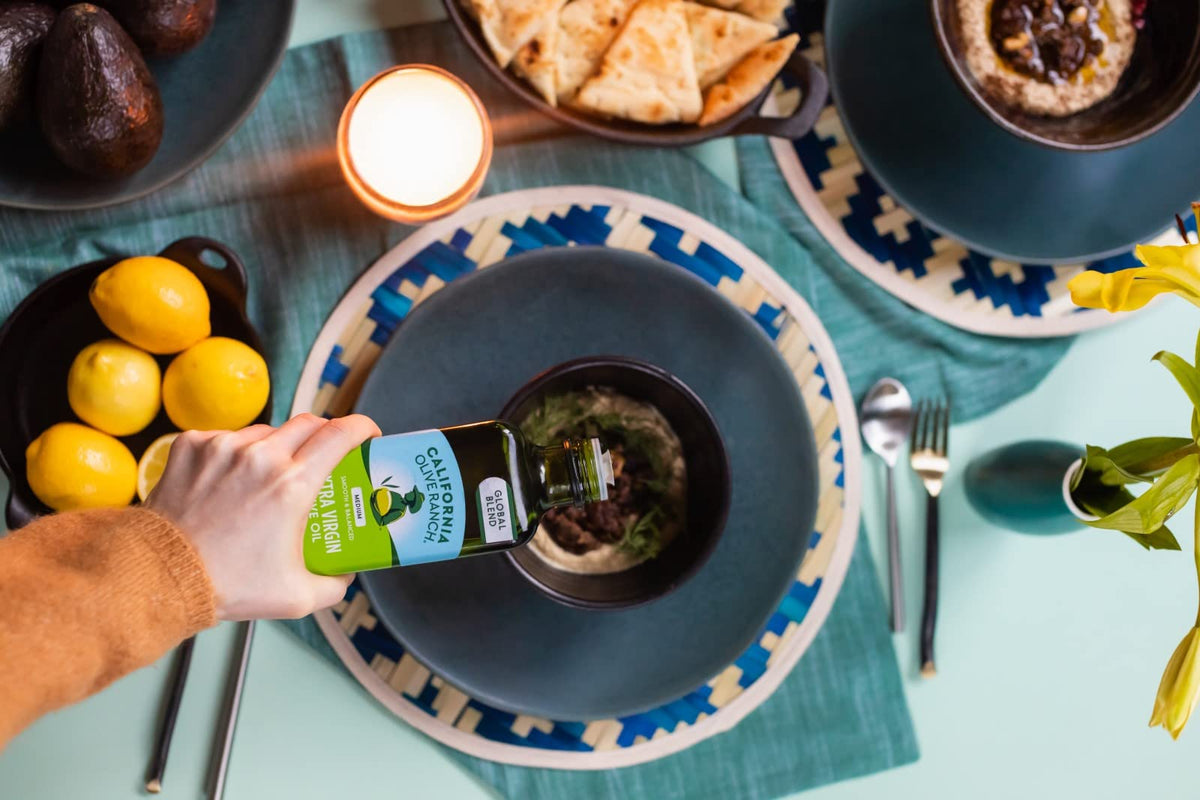 California Olive Ranch Global Blend Mild EVOO in a kitchen scene for versatile meals.