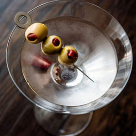 Calivirgin Dirty Martini Mix olives on display emphasize organic quality and flavor.