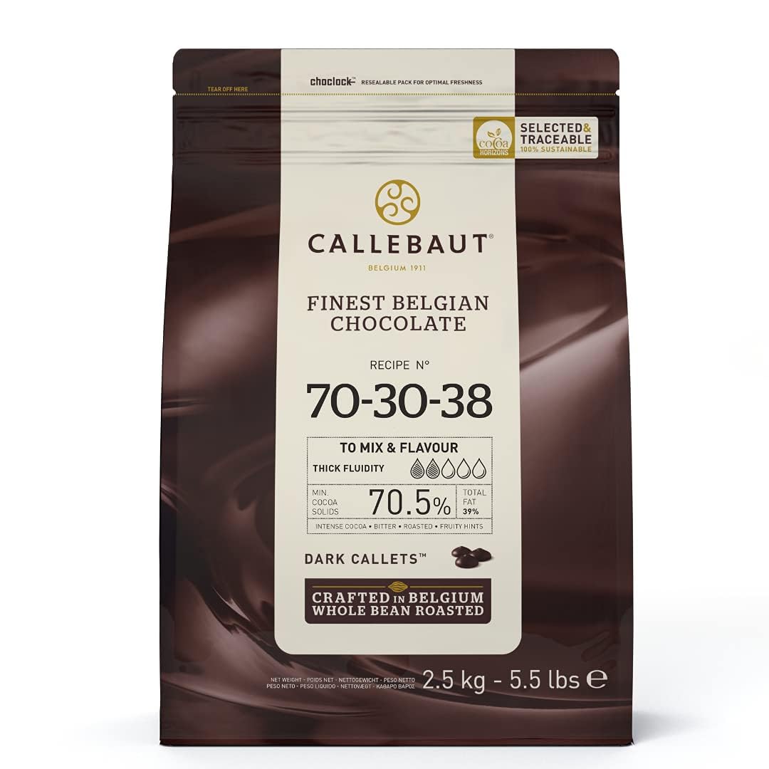 Callebaut 70% dark chocolate callets in bag for versatile baking and tempering.