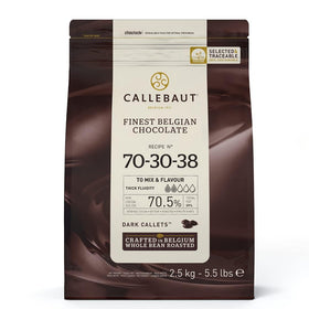 Callebaut 70% dark chocolate callets in bag for versatile baking and tempering.