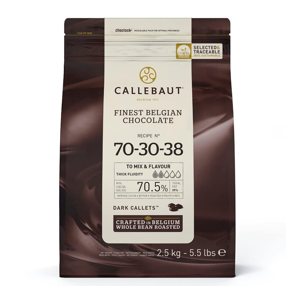 Callebaut 70% dark chocolate callets in bag for versatile baking and tempering.
