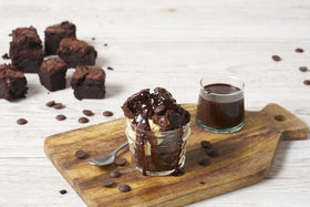 Melting Callebaut 70% callets demonstrating smooth flow for tempering and molding.