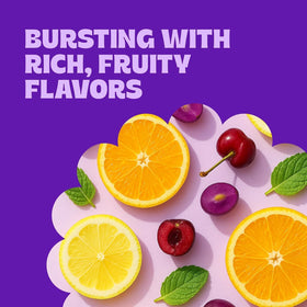 Cambie grape fruit slices candy closeup deep purple bite