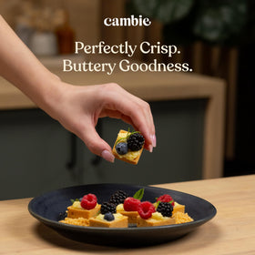 Cambie shells arranged for patisserie-style desserts in a cafe setting.