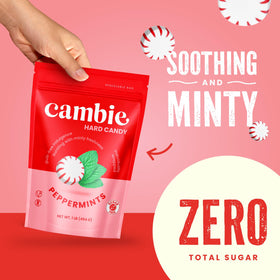 Cambie sugar-free peppermint wrapped piece on desk for post-meal breath freshening