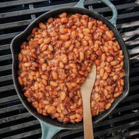 Camellia Brand pink beans simmering in chili for rich flavor.