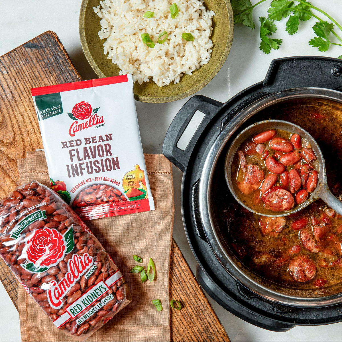 Beans and rice plated with Camellia flavor infusion.