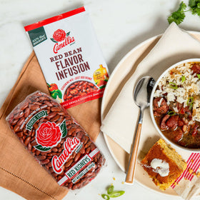 Serving plate of red beans and rice with fragrant aroma.