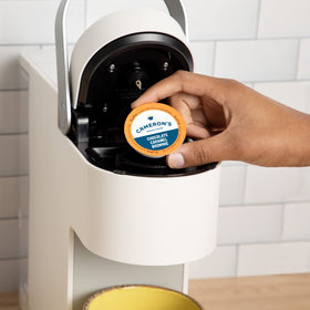 Cameron's compostable coffee pods with filter for eco-friendly brewing.