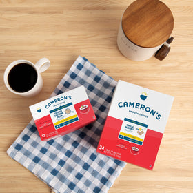 Cameron's Coffee decaf vanilla hazelnut pods steaming cup shows rich aroma