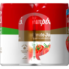 Campbell's 100% Tomato Juice nutrition label on the can highlighting Vitamin C.