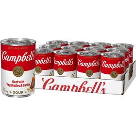 Campbell's beef with vegetables and barley cans on shelf for quick meals.