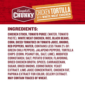 Close-up of diced tomato, black beans, and rice in Campbell’s Chunky Chicken Tortilla Soup.