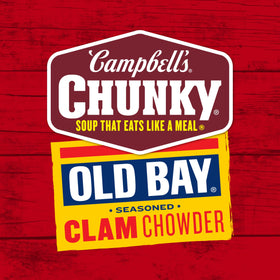 Campbell's Chunky OLD BAY Clam Chowder warmed outdoors by campfire.
