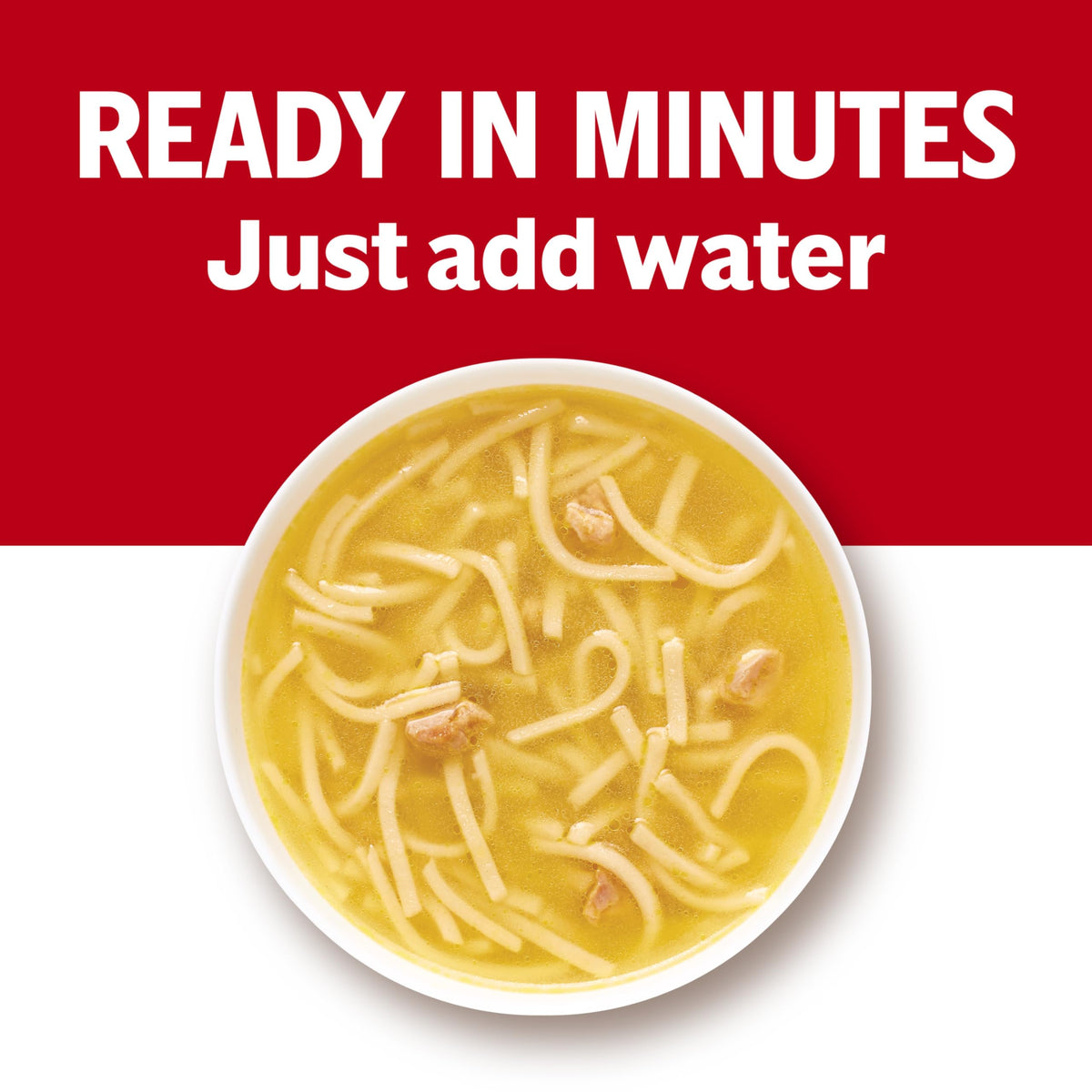 Campbell's condensed chicken noodle soup can pouring into a bowl for quick meal