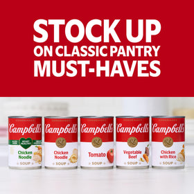 Twelve-pack Campbell's soup cans held by hand for easy meal prep