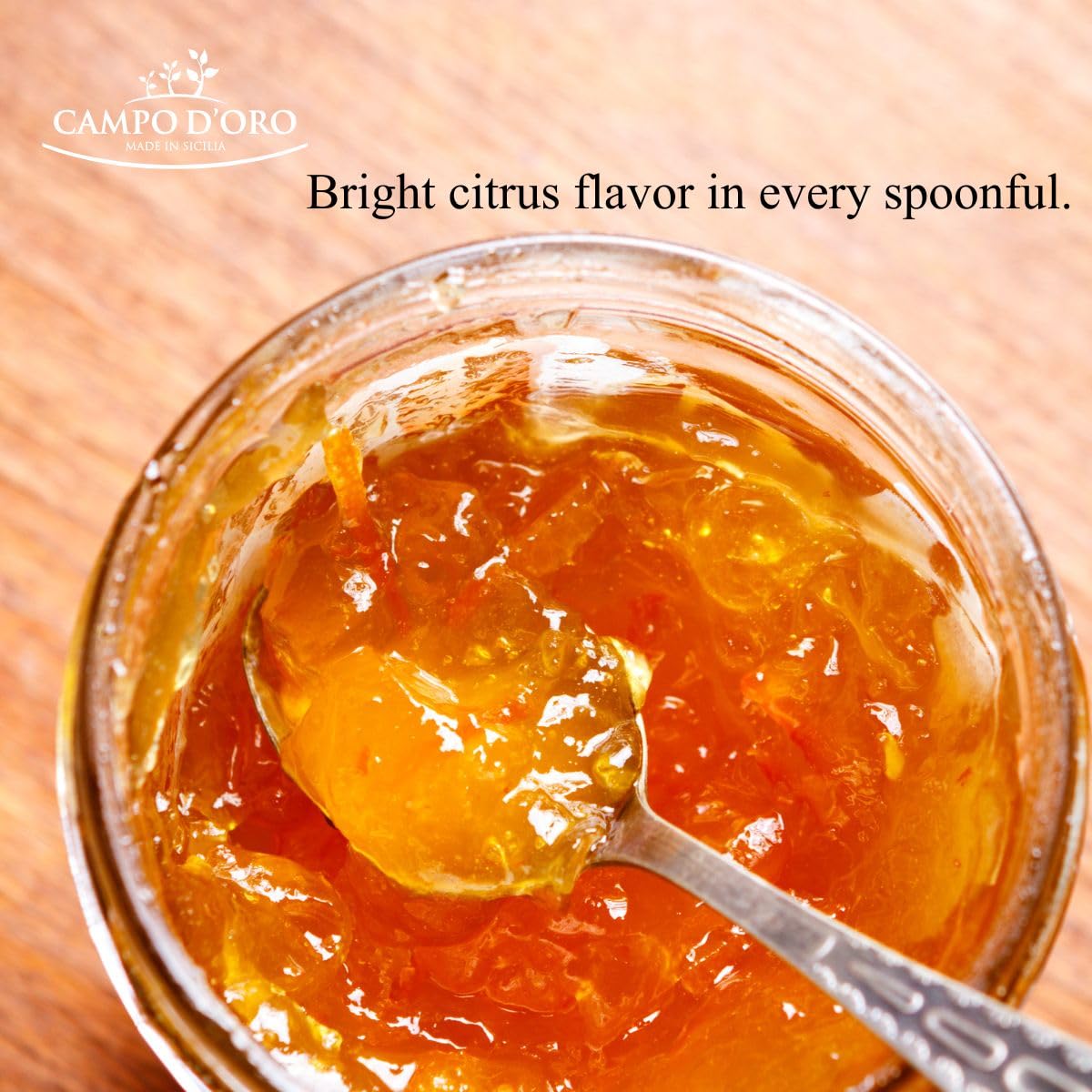 Campo D'Oro marmalade being poured over toast for a bright breakfast.